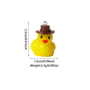 Detailed view of yellow resin duck pendant with brown hat and exact measurements