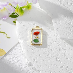 Handmade rectangular resin flower pendant with gold metal frame and colorful dried florals