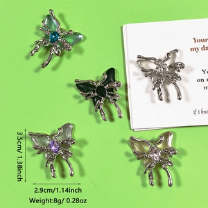 Five butterfly pendants in various colors showing dimensions of 3.5cm by 2.9cm