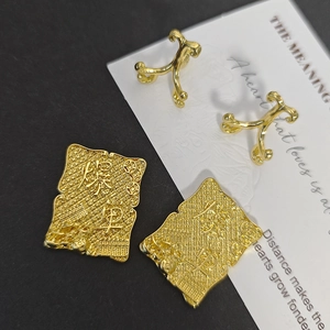 Golden alloy branch earrings and rectangular tags with Baodan character engraving