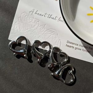 Set of four heart-shaped silver alloy lobster clasps for DIY jewelry making