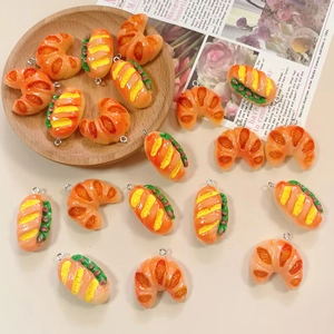 Miniature resin bread pendants including croissants and sandwiches for DIY jewelry making