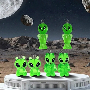 Glow-in-the-dark green resin alien UFO charms for DIY jewelry and Halloween crafts