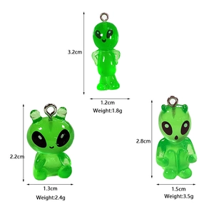 Three creative green resin alien pendants with dimensions and weights on white background