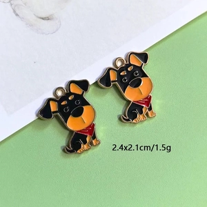 Detail view of cartoon enamel puppy charms with size specs 2.4x2.1cm and 1.5g weight
