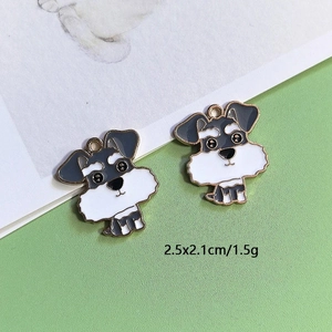 Detailed view of cute schnauzer enamel dog pendants with golden metal edges for DIY crafts
