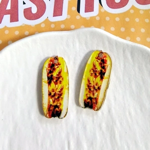 Detailed view of acrylic food pendants with realistic textures for DIY jewelry