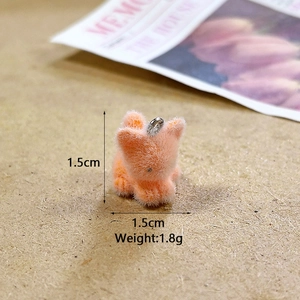 Detailed close-up of 1.5cm orange flocked cat pendant with silver metal loop and size labels
