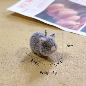 Close-up of grey flocked hamster pendant showing precise 2.1cm length dimensions