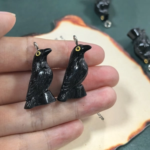 Handcrafted black resin crow charms for DIY jewelry making with realistic carved texture