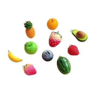 Colorful resin fruit charms including strawberry and pineapple with metal loops for DIY crafts