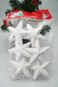 Detail of 6pcs white foam star ornaments with colorful sequins and silver hanging strings
