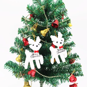 Set of two white 11cm foam reindeer Christmas ornaments with red bows on a decorated tree