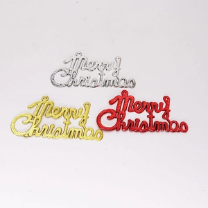 Detail of Merry Christmas letter plaques in gold, silver, and red plated plastic finish