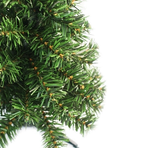 Detailed view of high-density dark green PVC needles on a 30cm mini Christmas tree
