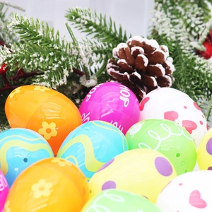Close-up of colorful patterned Easter eggs nestled in festive pine branches and pinecones