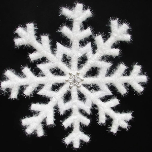 White 3D plush snowflake ornament with silver centerpiece for wedding stage and holiday decor