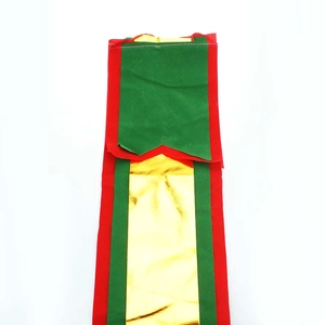 Close-up of 3m gold, red, and green wave-pattern Christmas hanging banner decorations