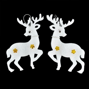Detail of white foam Christmas reindeer pendants with glitter, pearls and gold sequins