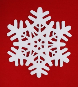Detailed close-up of a white 70cm Christmas foam snowflake with geometric cutouts