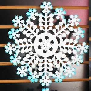 Detailed view of 70cm white snowflake hanging ornament with blue frosted edges for Christmas