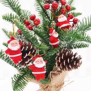 Flocked Santa Claus ornaments with pine cones and berries for Christmas tree decoration