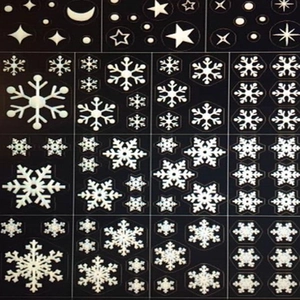 Witte kerstraamstickers set met sneeuwvlokken en sterren voor feestelijke raamdecoratie