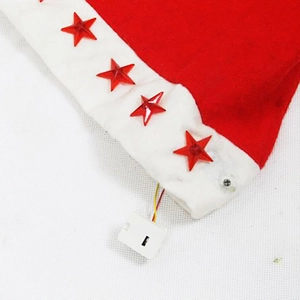 Festive red Christmas hat with glowing LED stars and internal battery power box