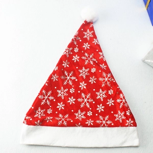 Detailed view of red plush Christmas hat with silver snowflakes and white faux fur trim