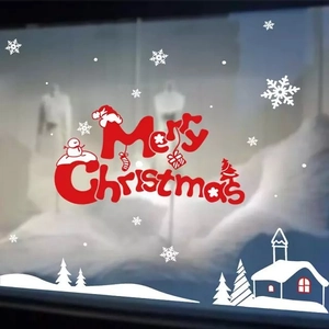 Detail van Merry Christmas raamstickers met witte sneeuwvlokken en rode belettering