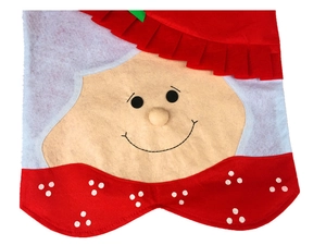 Detailed view of the handmade facial stitching and felt texture on a Christmas chair cover