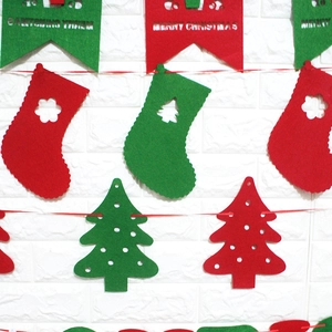 Felt Merry Christmas banner with red and green socks and trees for holiday party decoration