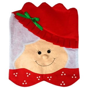 Christmas Mrs. Claus chair cover in red felt with a green bow for festive dining decor