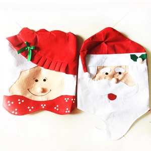 Christmas chair covers set with Santa Claus and Elf motifs for holiday dining room decor