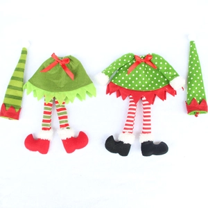 Detail of Christmas elf wine bottle covers featuring felt fabric and festive elf outfits