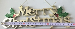 Detail of 29cm golden Merry Christmas sign with red berries for holiday tree decoration