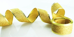 Close-up of premium gold glitter ribbon roll for Christmas tree decor and gift wrapping
