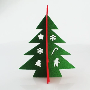 DIY 3D felt Christmas tree table ornament with red and green cutout festive patterns