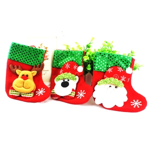 Christmas stocking set with sequins featuring Santa, reindeer, and polar bear designs