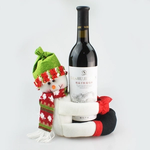 Christmas snowman wine bottle cover with green hat and plaid scarf for holiday decor