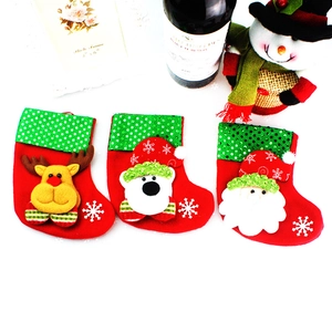 Three-piece Christmas stockings set with Santa, Reindeer, and Bear sequins on red felt