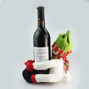 Detailed plush snowman wine bottle cover with red striped scarf and green pointed hat
