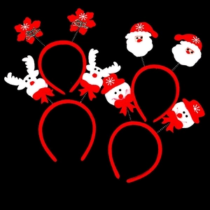Set of four Christmas headbands featuring Santa, Snowman, Reindeer, and Merry Christmas signs