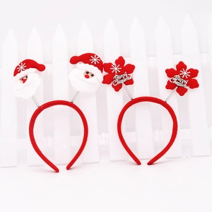 Festive Christmas headbands featuring Santa Claus and Merry Christmas snowflake decorations