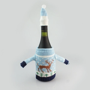 Knitted Christmas wine bottle sweater with reindeer and snowflake pattern and mini hat