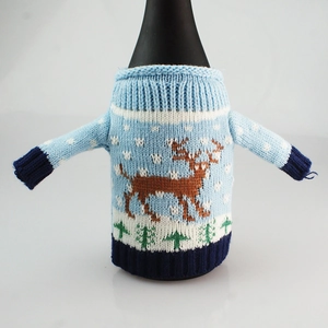 Detailed knitted Christmas sweater wine bottle cover with brown elk and green tree patterns