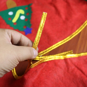Red non-woven Christmas tree skirt with snowman and felt tree patterns, 90cm diameter