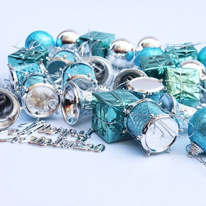 32-piece blue and silver Christmas tree ornament set with bells, gift boxes, and drums
