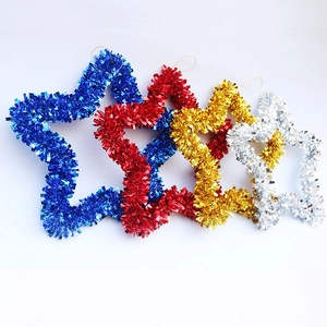 Detail view of 35cm star-shaped tinsel wreaths in blue, red, gold, and silver finishes