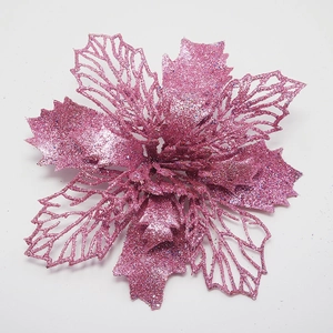 Detail van roze kerstbloem met glittercoating en holle mesh bloembladen voor decoratie